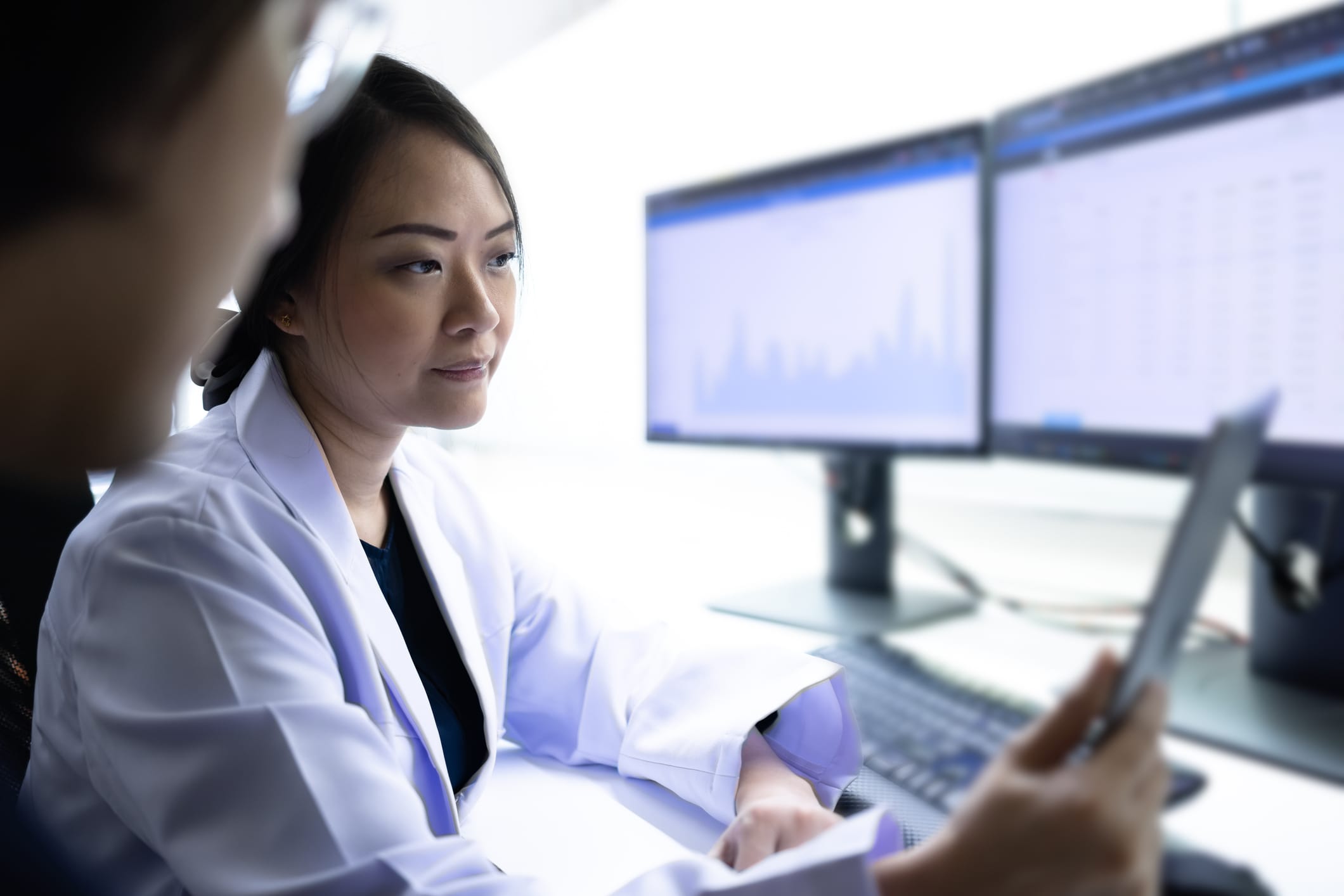 Medical researcher reviewing data